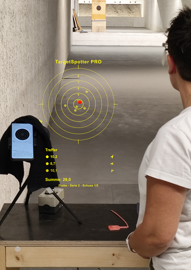 TargetSpotter PRO in use on the range, overlay with hit values